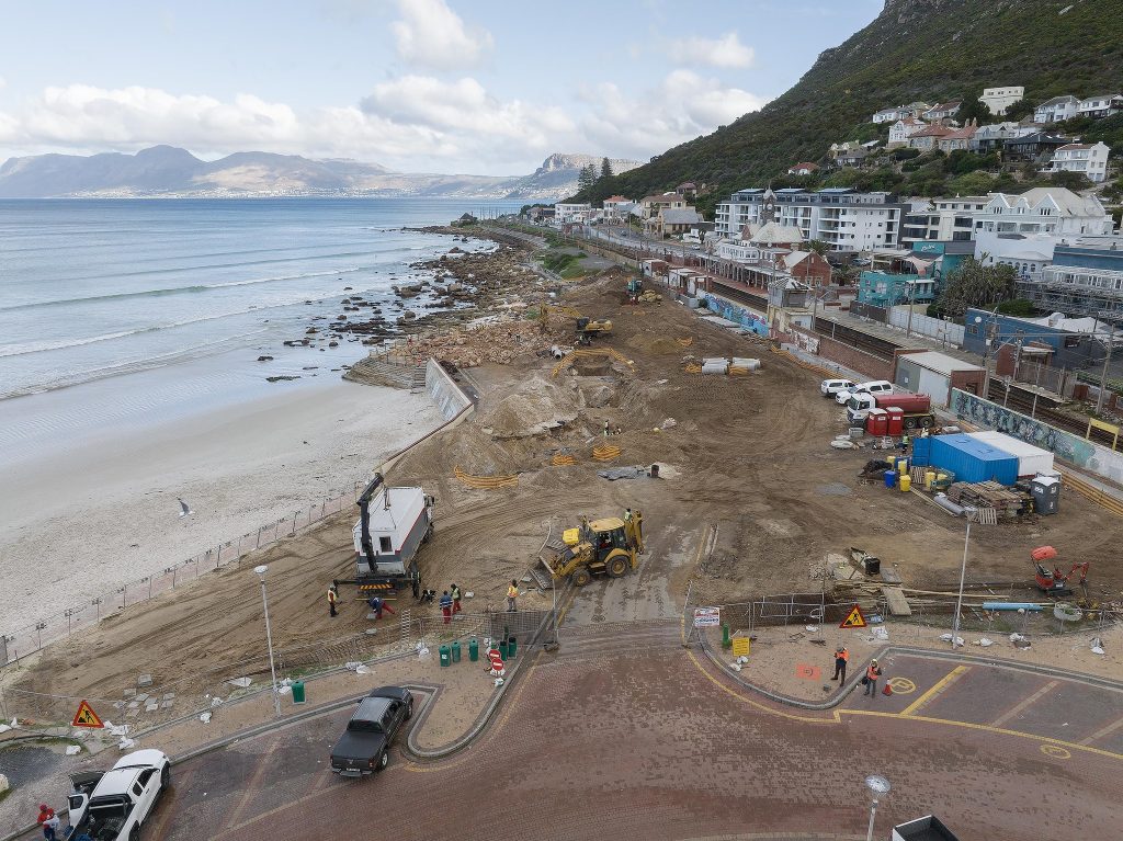 Ongoing redevelopment at Muizenberg Beach with construction and upgrades along the shoreline